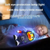 A baby is sleeping while a soft eye-protection lamp light illuminates an interactive dancing space duck with lights.