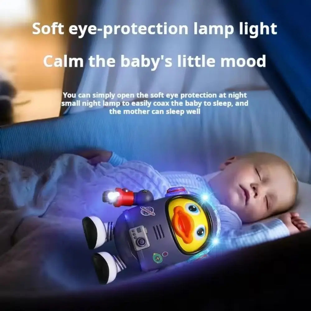 A baby is sleeping while a soft eye-protection lamp light illuminates an interactive dancing space duck with lights.