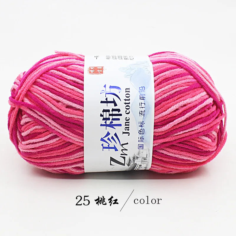 A ball of bright pink yarn labeled Zm Jane cotton yarn for knitting and crochet