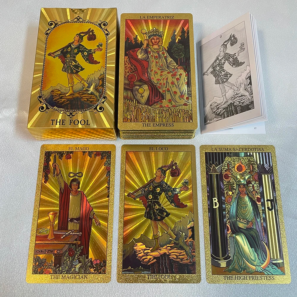 A collection of gold foil tarot cards featuring The Fool, The Empress, The Magician, The Fool, and The High Priestess.