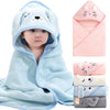 A soft light blue hooded towel featuring a cat design, shown alongside folded towels in pink and gray tones.