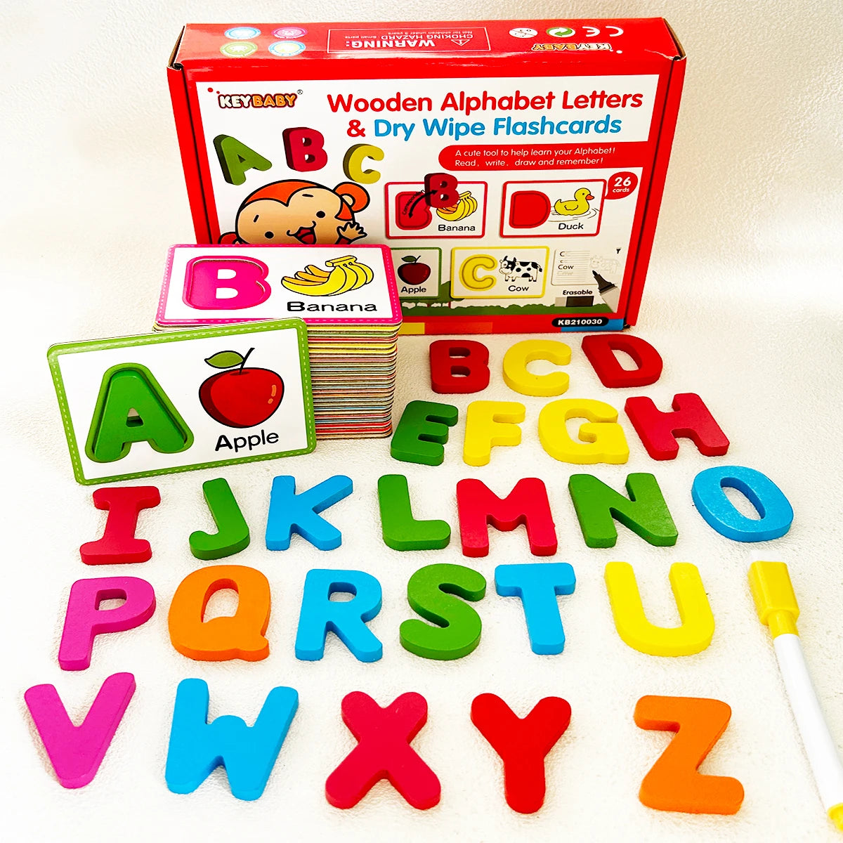 A set of wooden alphabet letters and dry wipe flashcards for learning, including uppercase and lowercase letters.