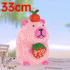 Pink capybara building block pen holder and desk organizer with a strawberry detail