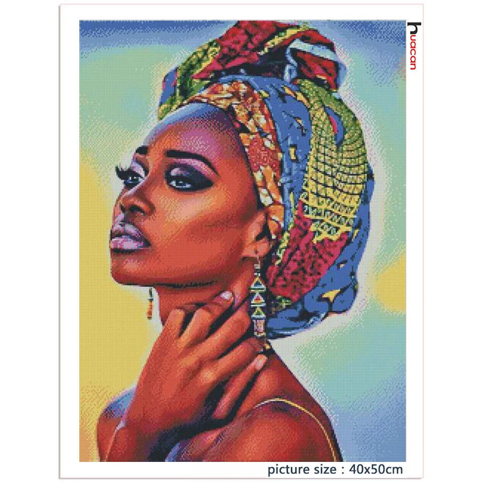 A close-up portrait of a woman wearing a colorful headwrap, painted in diamond art style.