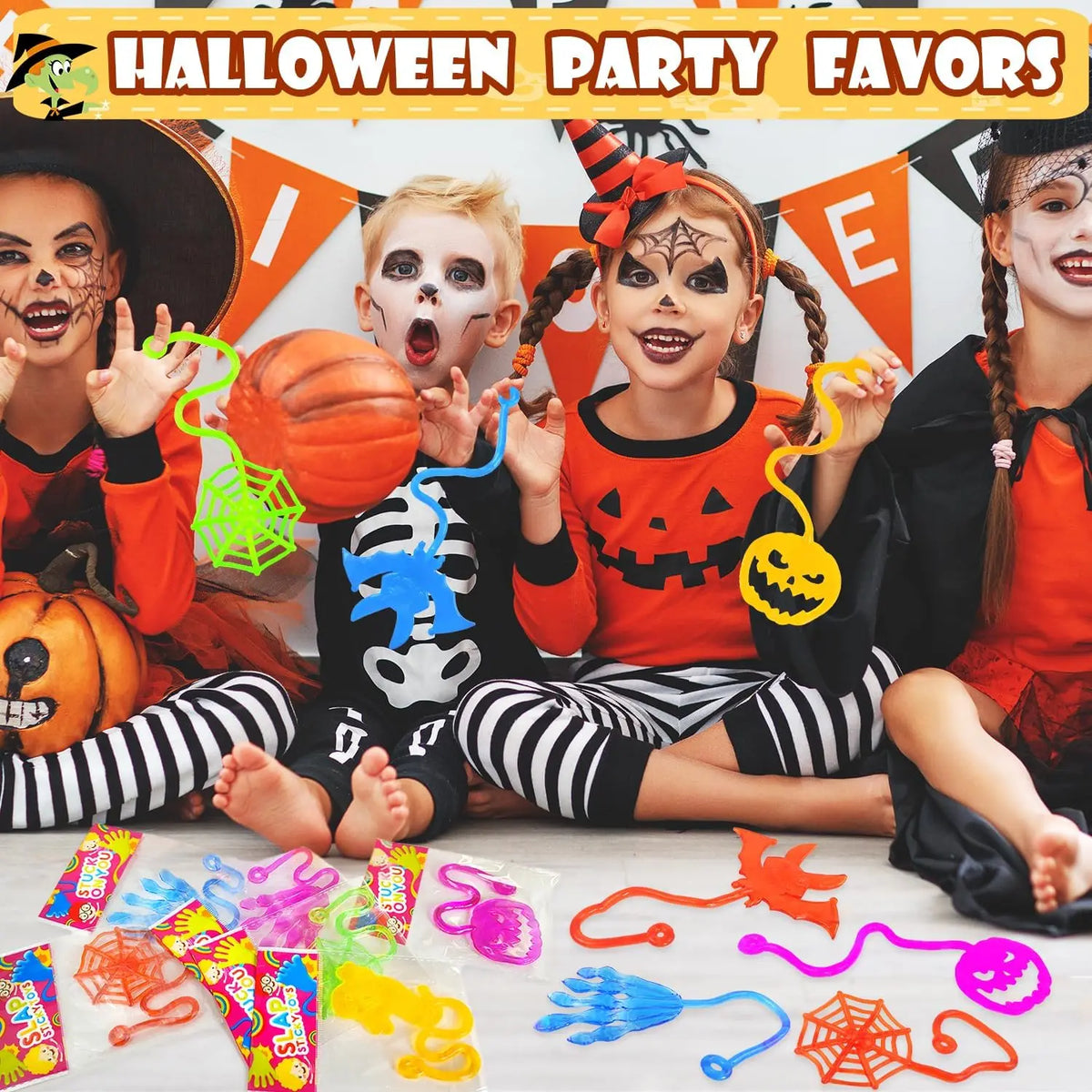 A collection of colorful sticky spider web and orange Halloween party favors for children.
