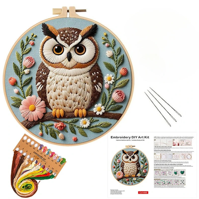 Embroidery kit featuring an owl with flowers as a stamped pattern for DIY craft.