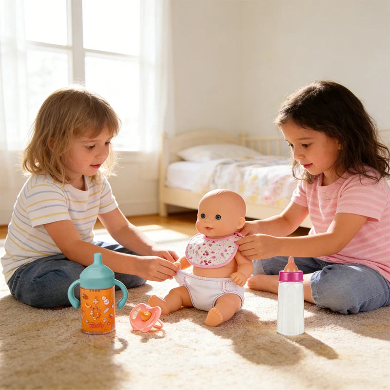 Two young children are interacting with a baby doll and feeding accessories on a light-colored rug.