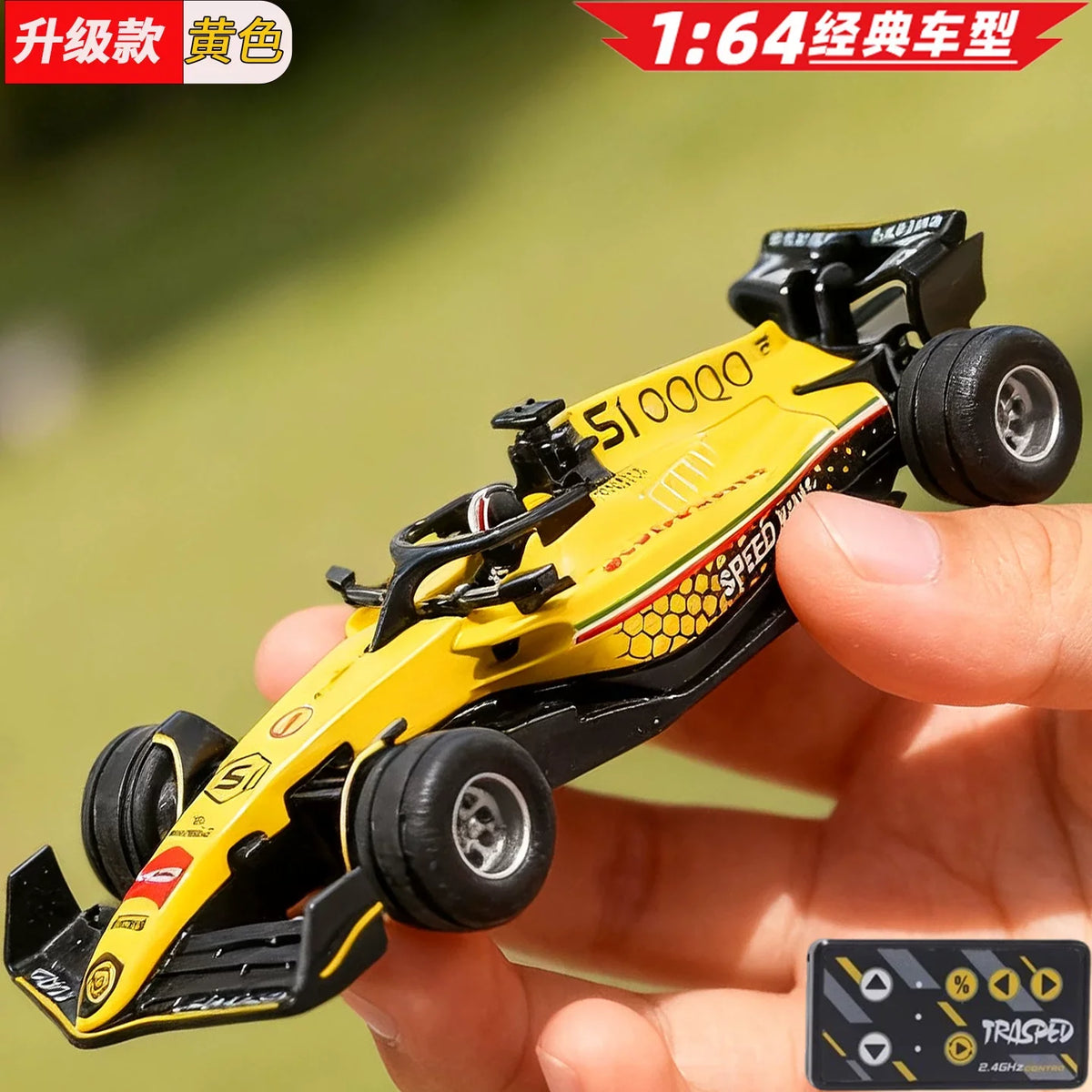 A yellow 1:64 scale RC drift car is held in a hand, showing its detailed features and tires.