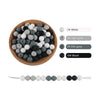 A collection of round silicone beads in various shades of gray and white, including light gray, dim gray, and black.