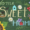 A green background features the words Home Sweet Home in various fonts and illustrations like a butterfly, flowers, and a bir