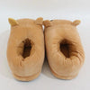 A pair of tan Rilakkuma plush indoor slippers with floppy ears.
