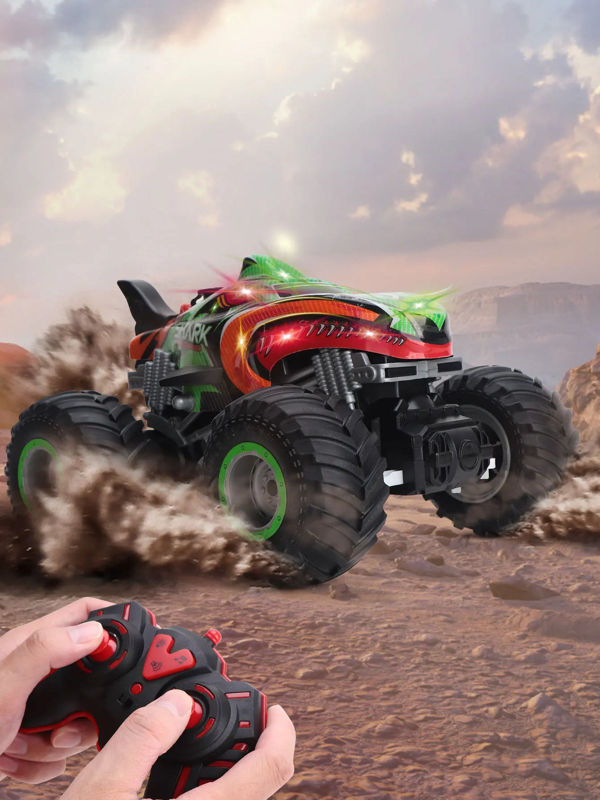 An All-Terrain RC monster truck is shown in action, kicking up dust and spray against a cloudy sky.