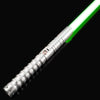 A silver lightsaber with a green blade is shown diagonally against a black background.