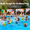 A person is playing with colorful inflatable beach balls in a swimming pool.