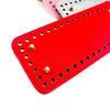 A red PU leather crochet bag with pre-punched holes is shown next to other colored bags.