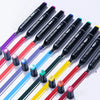 A set of dual-tip alcohol markers in various colors, including purple, red, blue, and yellow, arranged diagonally on a white 