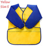 Yellow waterproof kids art and baking apron with blue long sleeves