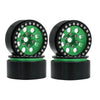 A pair of black metal beadlock wheels with a green center and removable hex hub for an RC crawler.