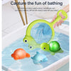 A green silicone bath toy set with a light-up scoop and several colorful bath toys floating in water.