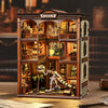 A detailed wooden model kit of a fossil museum with glass display cases and internal dioramas.