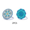 Two folding diamond art mirrors with leather covers featuring intricate blue and turquoise floral designs
