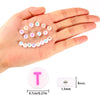 A hand holds a cluster of acrylic alphabet beads spelling 'YOU'S 2021 LIGHTN' arranged in a circle.
