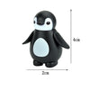 A black and white penguin building block with a white belly, shown from the top.