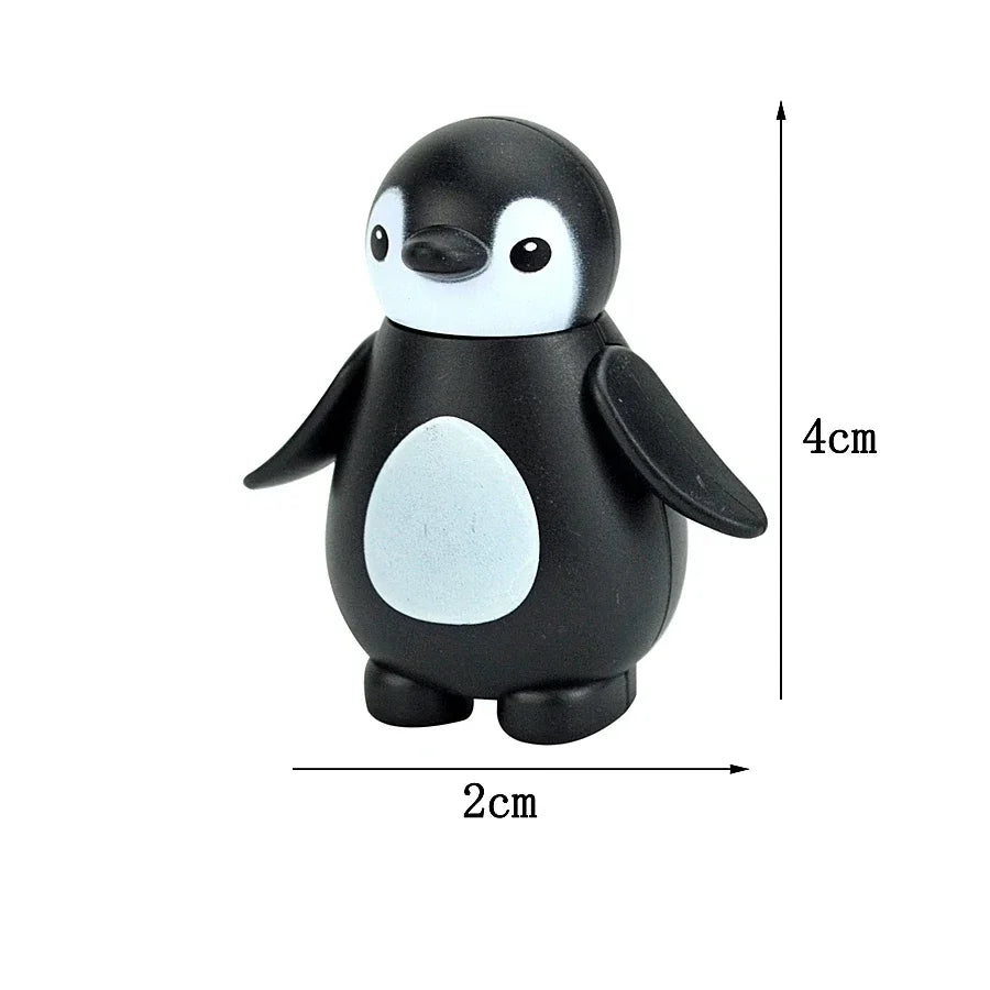 A black and white penguin building block with a white belly, shown from the top.