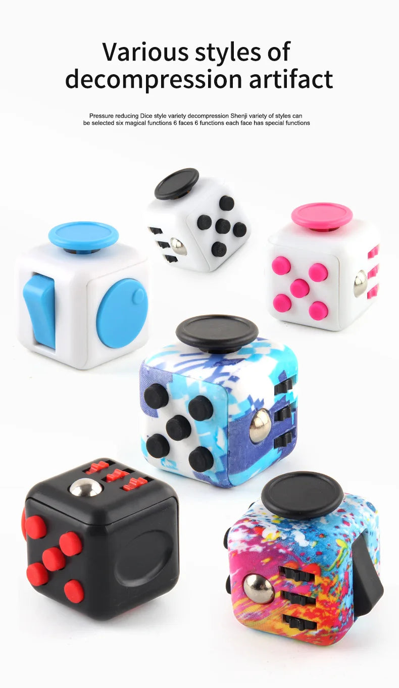 A collection of various styles of decompression artifacts including dice and fidget cubes with magnetic buttons