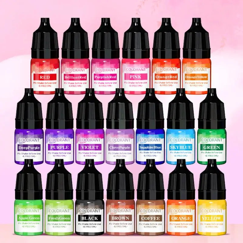 A collection of liquid colorants in various shades including red, pink, orange, yellow, and green bottles for DIY wax project