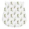 White muslin burp cloth with a pattern of green leaves for babies