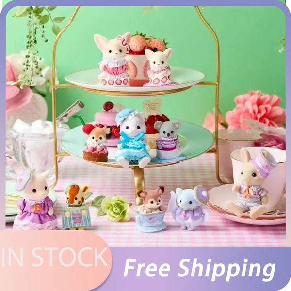 A collection of Sylvanian Families cutie tea party animal figures in various colors and pink accessories displayed on a gold 