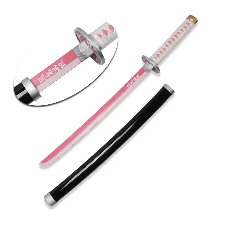 A replica Demon Slayer Tanjiro Katana sword with a pink and black design displayed on a white background.
