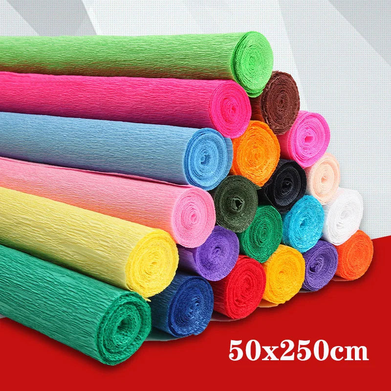A collection of colorful crepe paper rolls in various shades including green, pink, blue, and yellow.