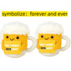 Two handmade yellow crochet beer mugs with white fluffy tops and yellow cards that say Don't worry beer happy