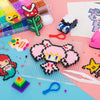 A craft kit featuring colorful fuse beads and white glue used to create animal pixel art puzzles.