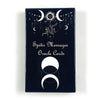 A dark box of Spirit Messages Oracle Cards featuring celestial symbols and a central sun design.