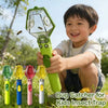 A smiling boy holds a green bug catcher with six magnifying viewers, showing various insect traps.