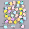 A collection of colorful enamel charm beads in various shapes and sizes for DIY jewelry making.