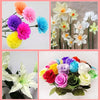 A collection of colorful crepe paper flowers and leaves used for DIY crafts and gift wrapping.