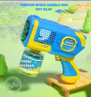 A blue and yellow electric bubble gun toy is shown with a bubble machine accessory on a wooden surface.