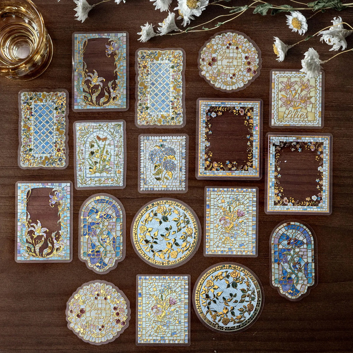 A collection of decorative PET stickers featuring floral and geometric patterns in gold, blue, and cream tones.