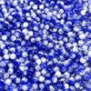 A close-up view of round blue and clear crackle glass beads for jewelry making.