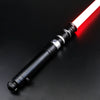 A black lightsaber with a red blade is shown diagonally against a dark background.