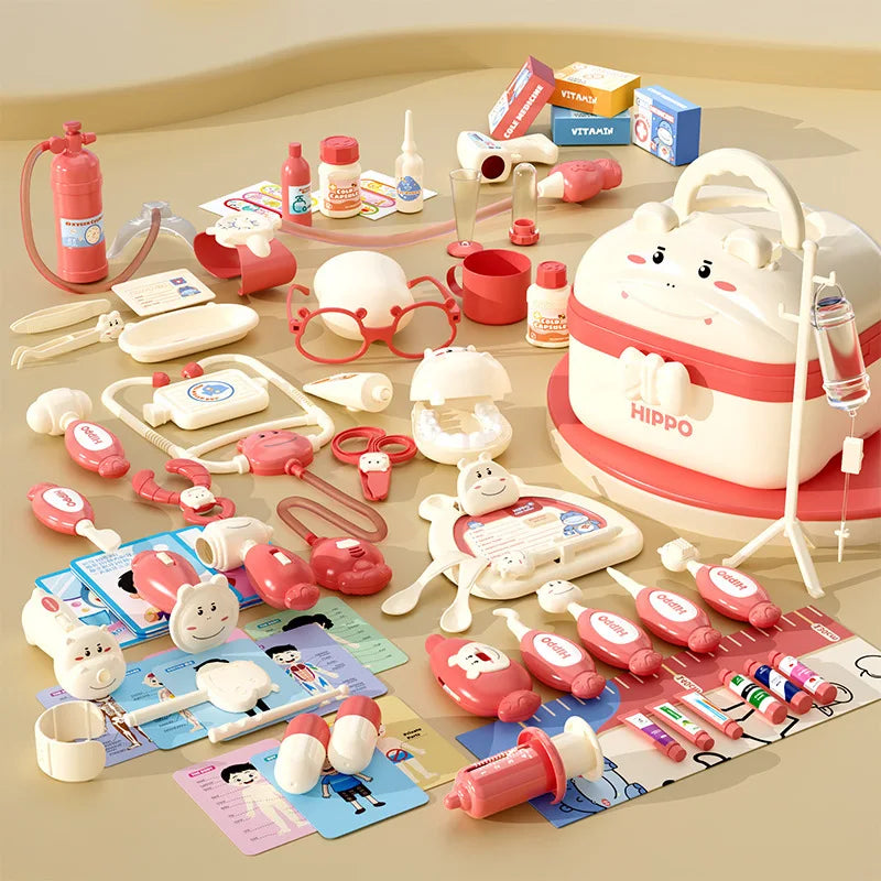 A pink and white kids pretend play doctor kit with various medical tools and a carrying case.