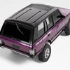 A purple LDRC 1:18 scale 4WD brushless RC crawler truck is shown from the rear three-quarter angle.