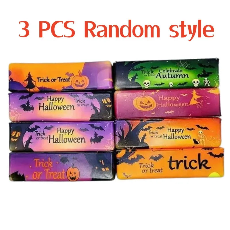 Three packs of random style spooky Halloween squishy stress toys in orange, green, and purple packaging
