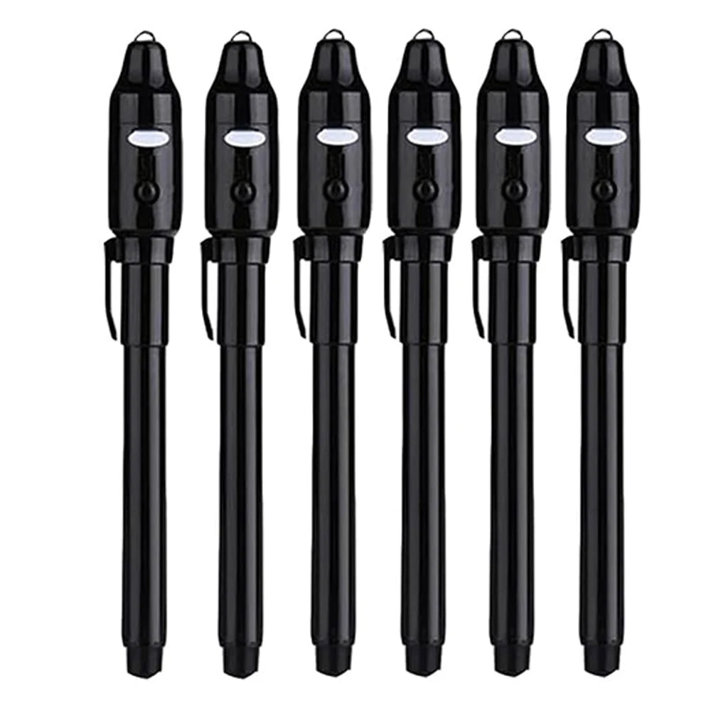 A set of black invisible ink spy pens with UV light for secret messages
