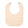A light peach colored soft cotton baby bib with an adjustable snap closure.