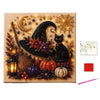 A DIY diamond painting art kit featuring a Halloween theme with a black witch hat, cat, moon, and autumn foliage.